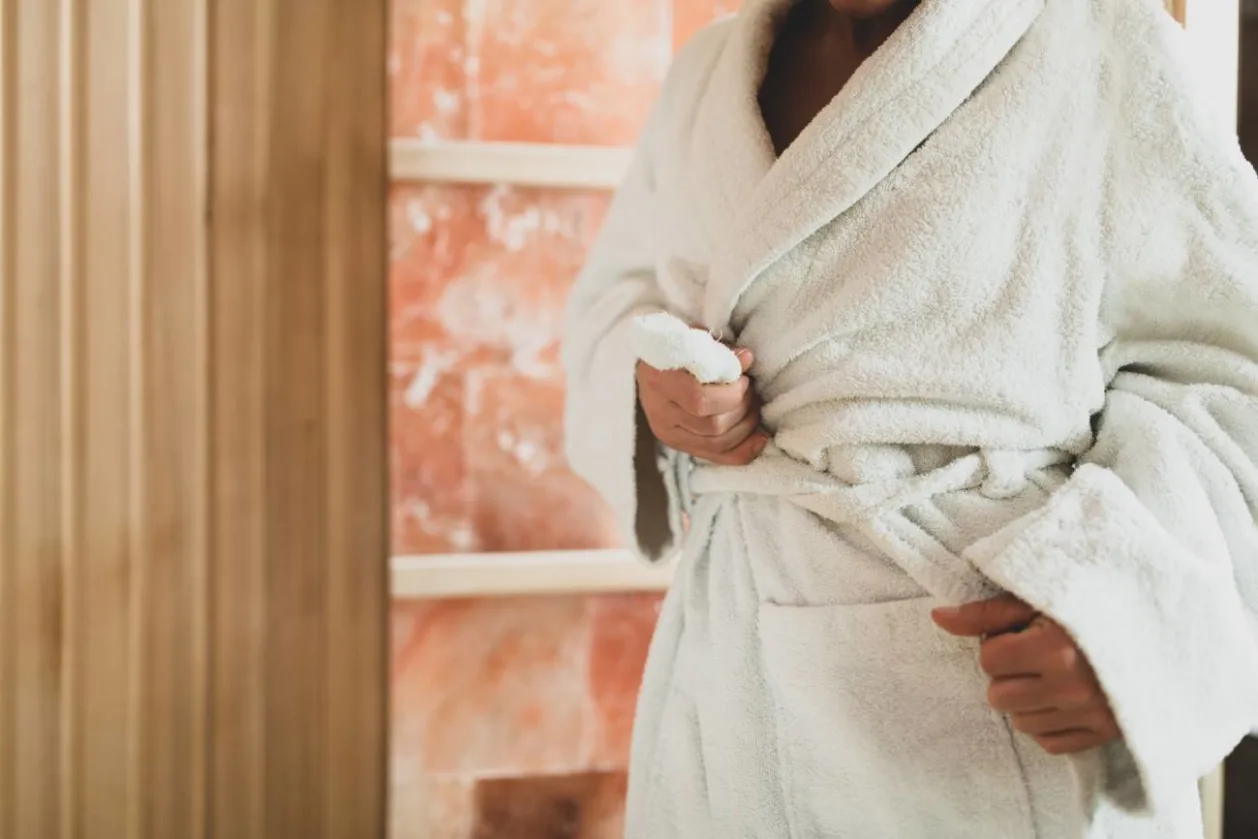person wearing robe in halotherapy room